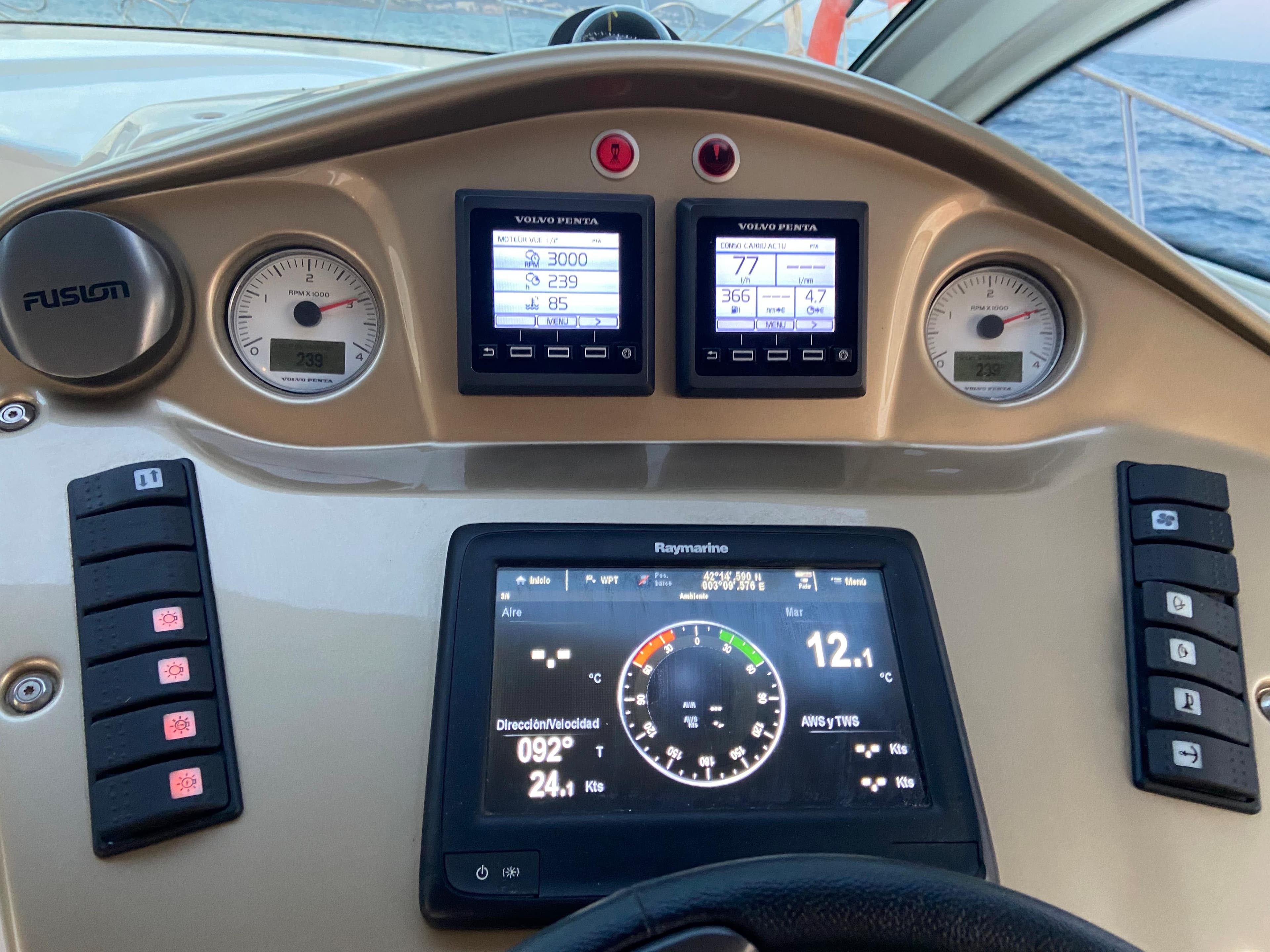 Dashboard of 2012 Cranchi M38 yacht with navigation and control displays.