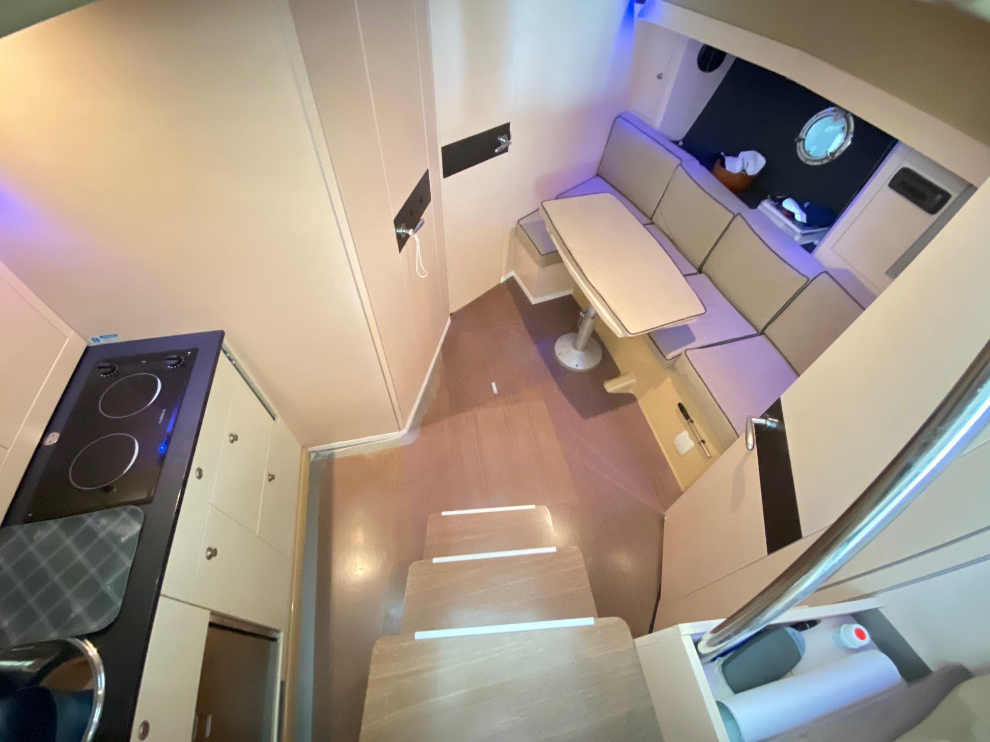 Interior of 2012 Cranchi M38 yacht with kitchen and seating area.