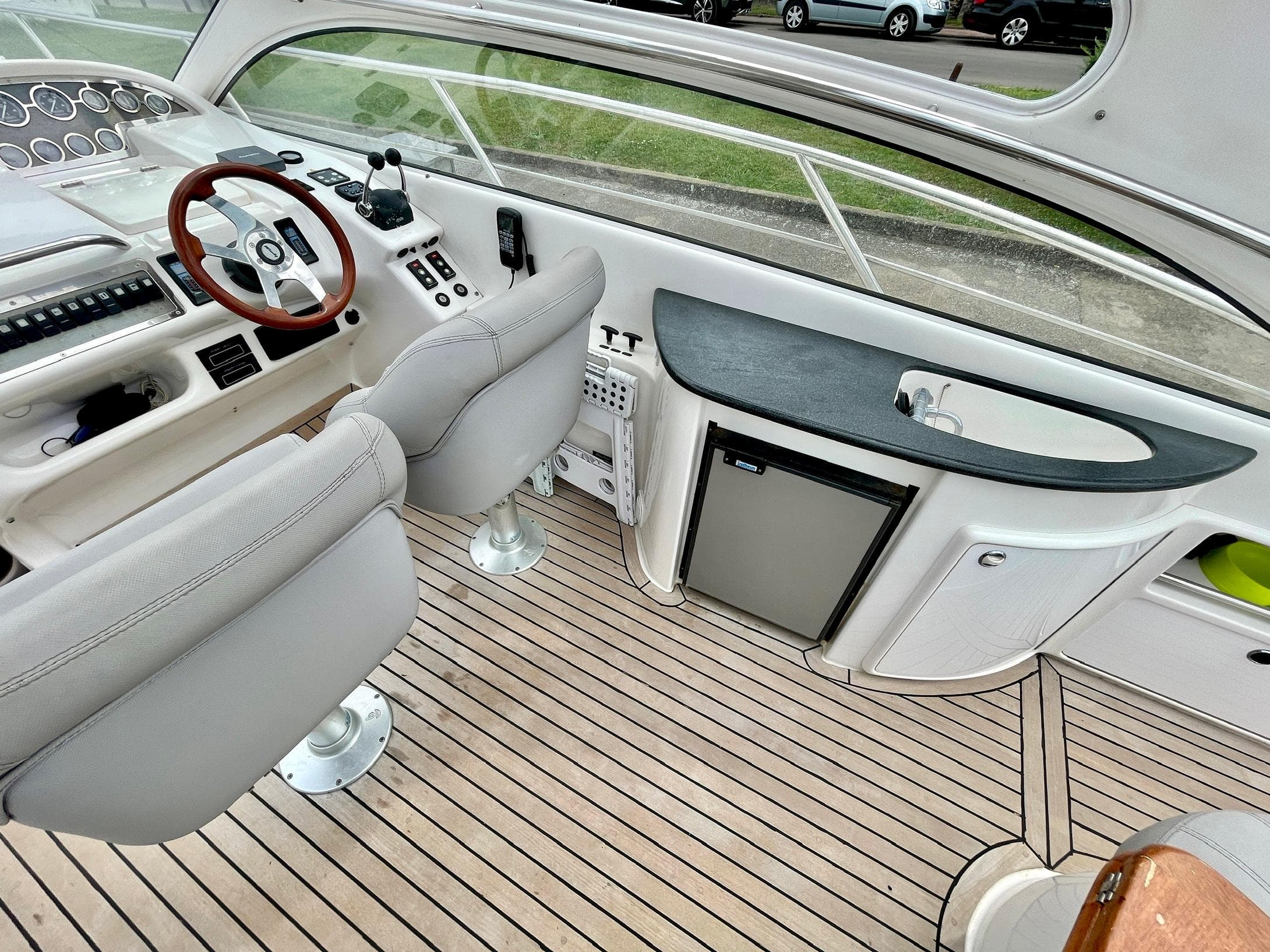 Interior of a 2003 Windy Bora 40 yacht with helm and seating.