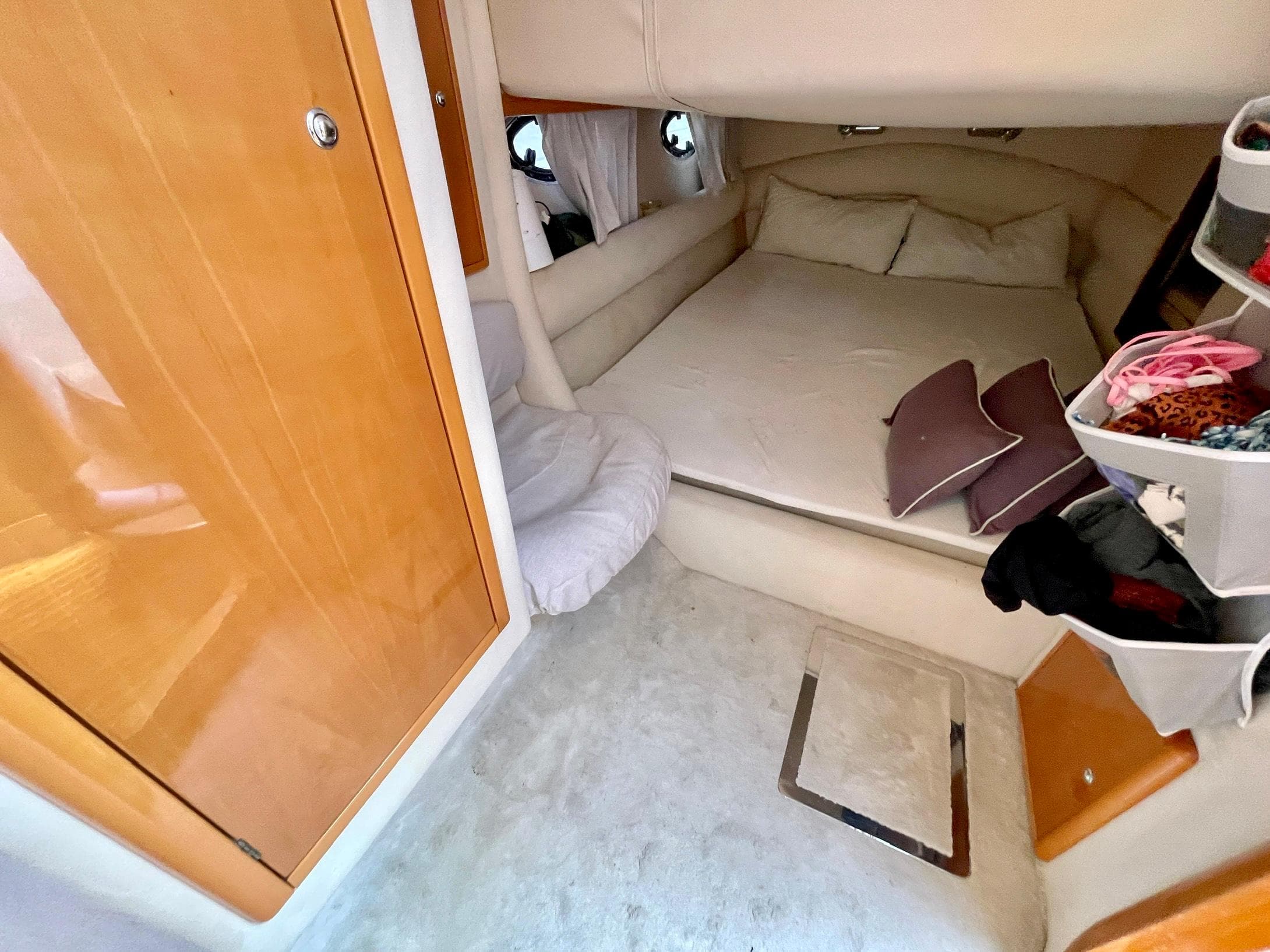 Interior of a 2003 Windy Bora 40 yacht with cozy sleeping area.