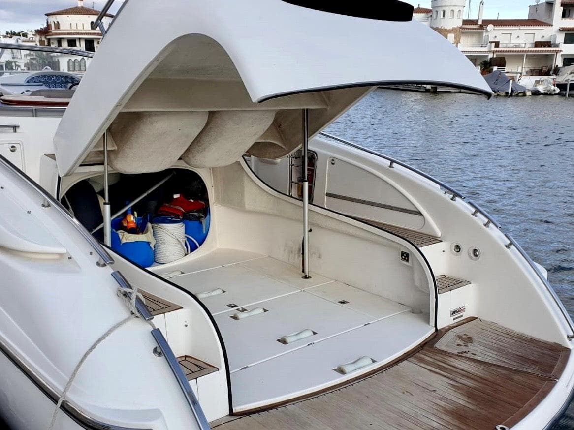 2003 Windy Bora 40 yacht with open rear storage compartment.