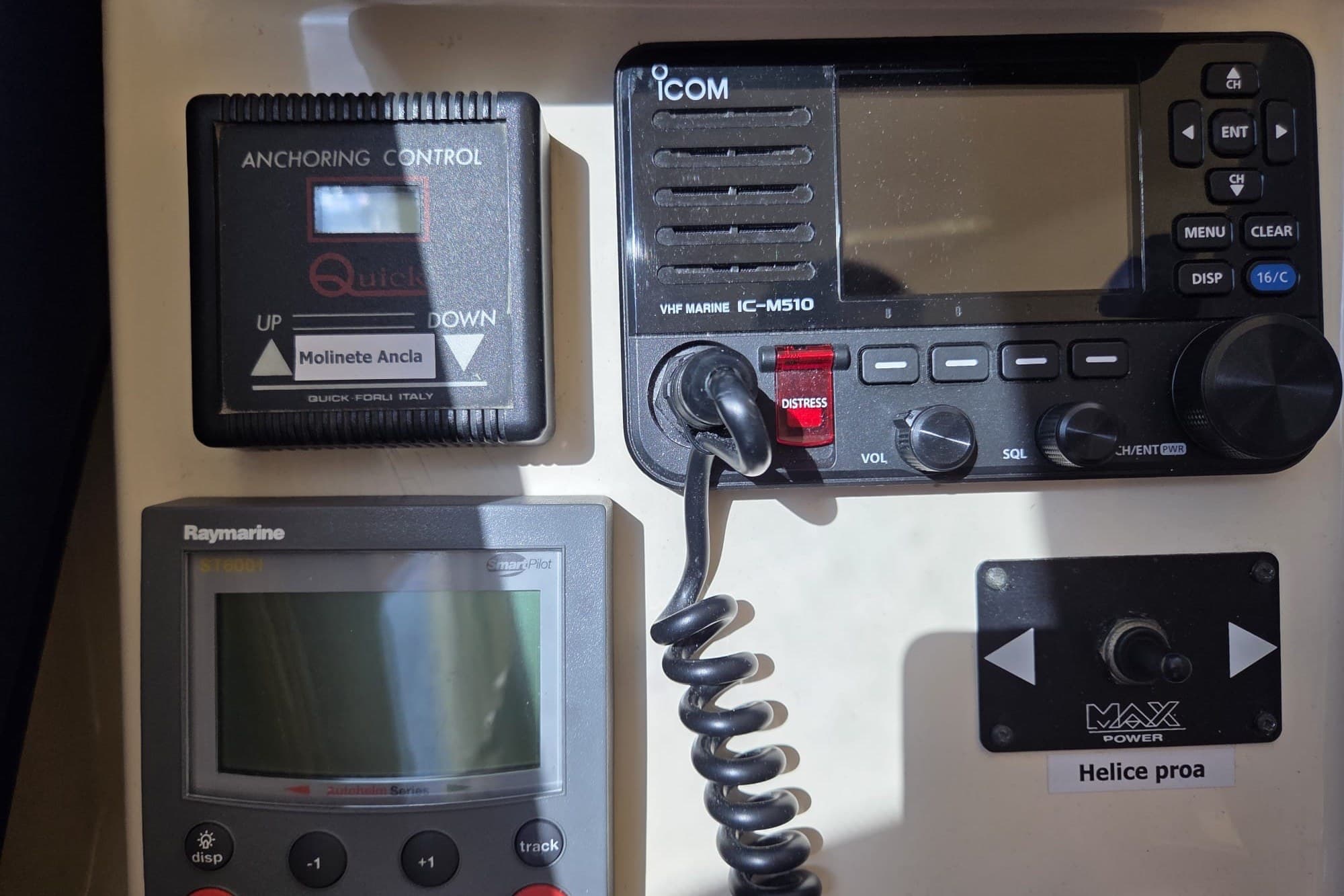 Control panel of a 1994 Azimut 43 yacht featuring navigation and communication equipment.