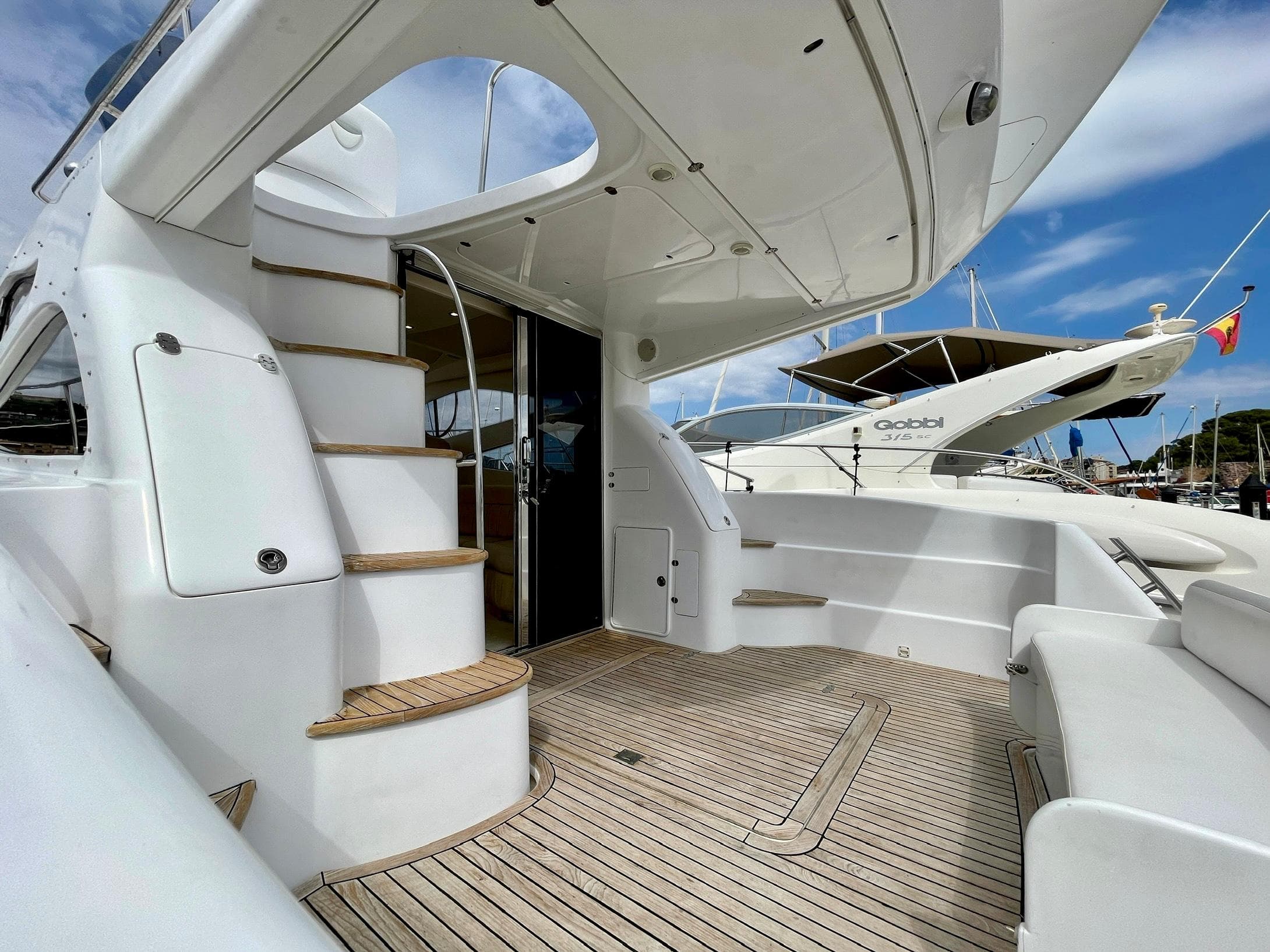 Genesis Boats 37 Flybridge 2006 yacht with sleek design and spacious deck area.