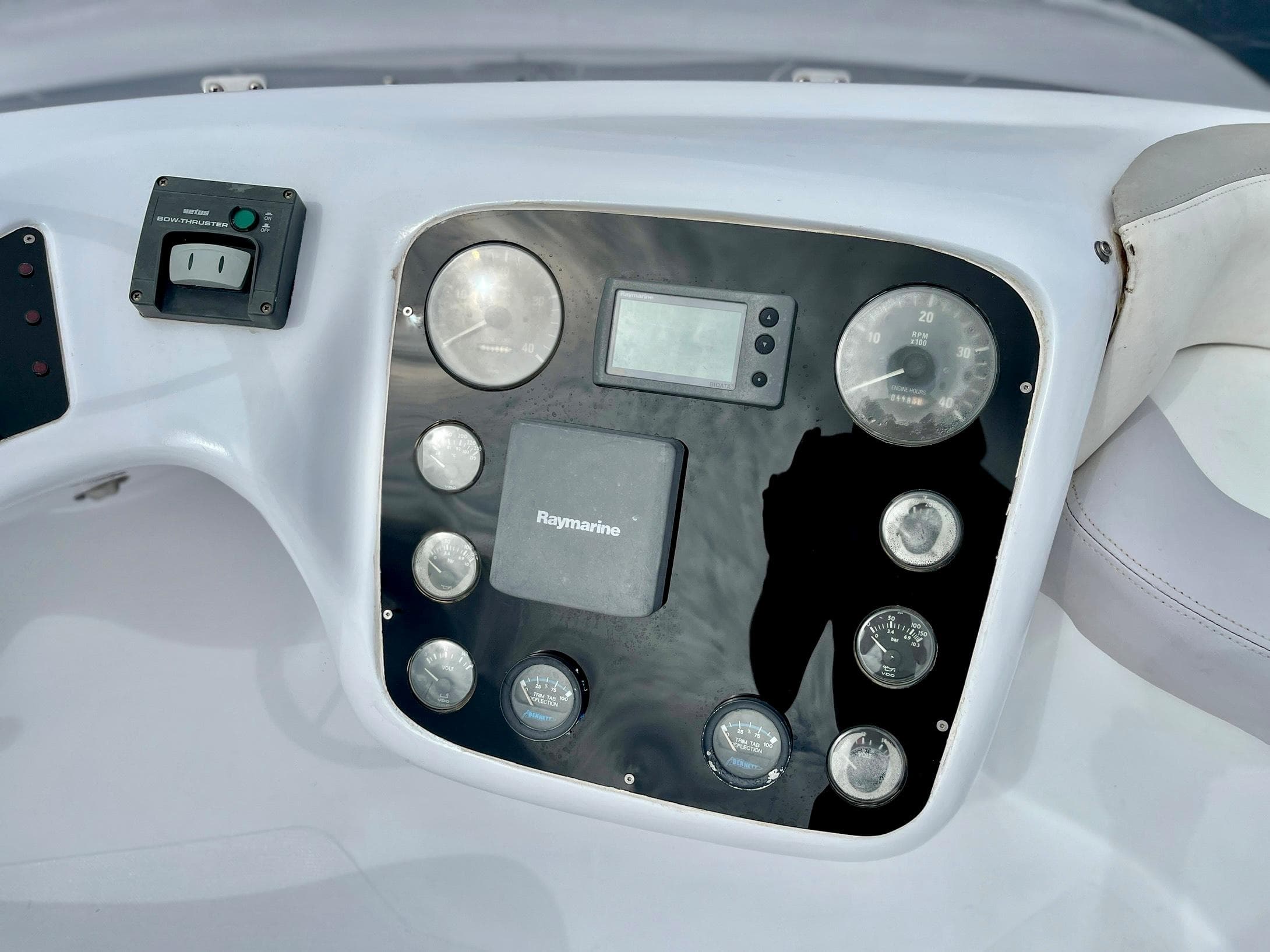 Genesis Boats 37 Flybridge 2006 dashboard with gauges and controls.