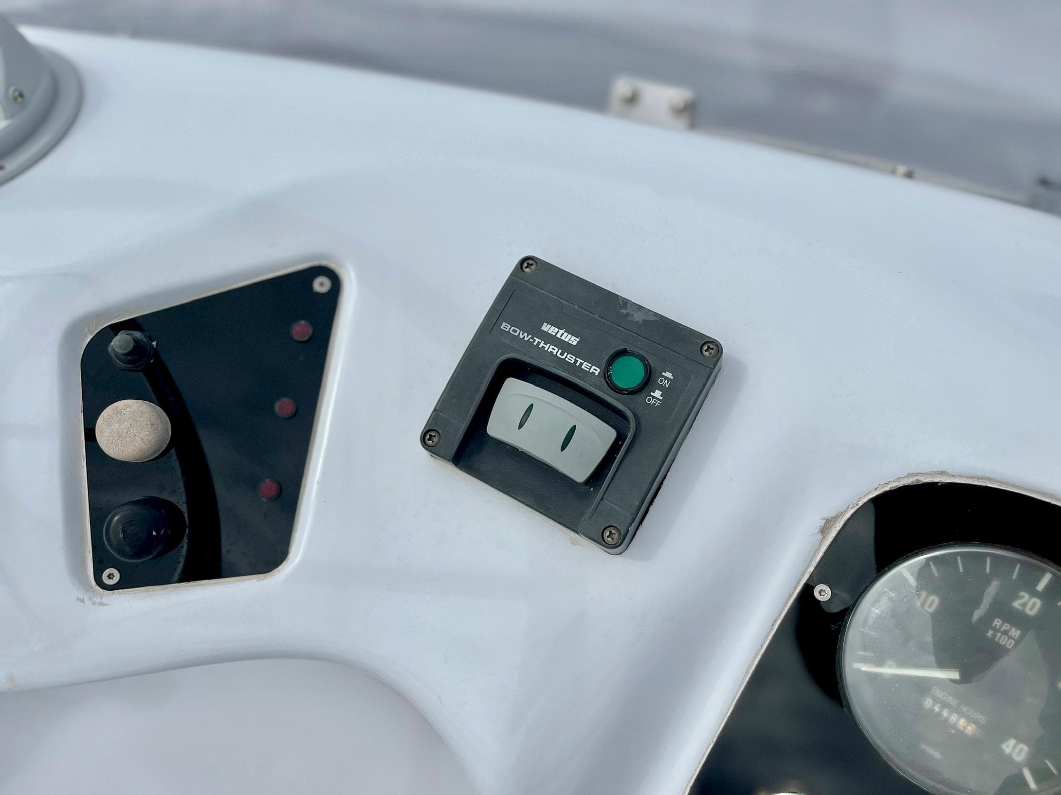 Control panel of 2006 Genesis Boats 37 Flybridge with gauges and switches.