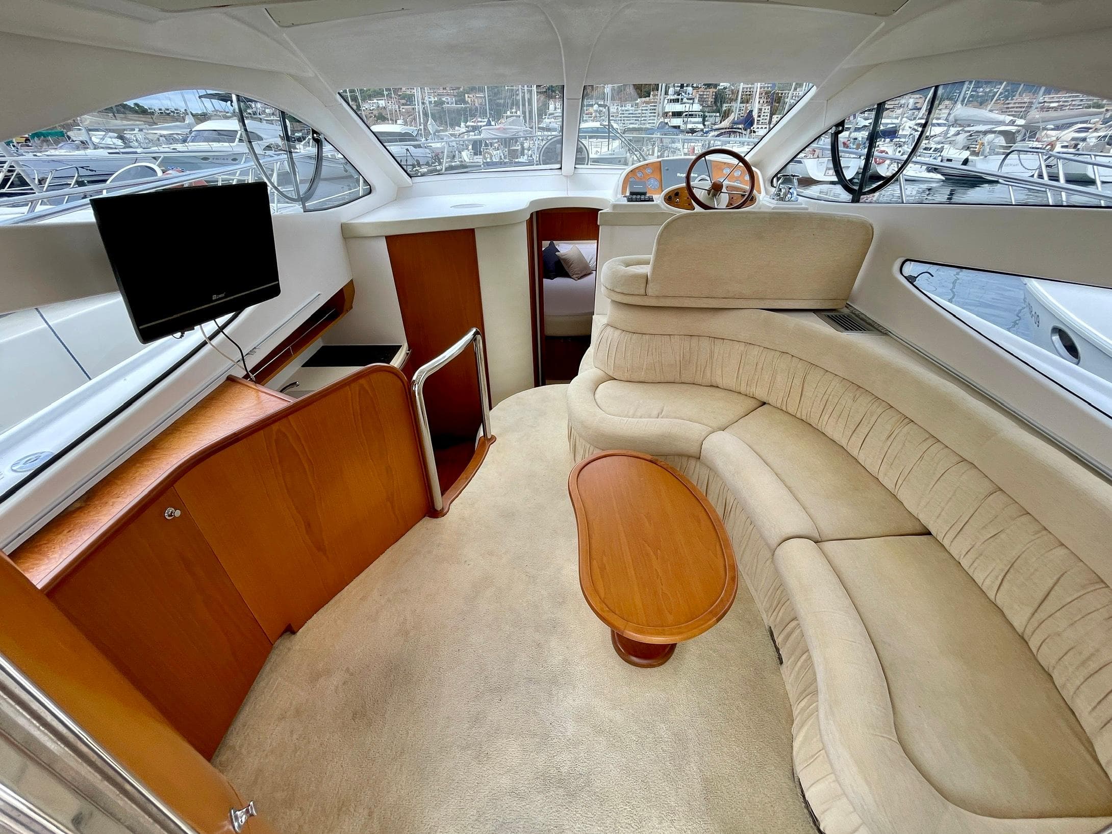 Luxurious interior of 2006 Genesis Boats 37 Flybridge with plush seating and modern amenities.