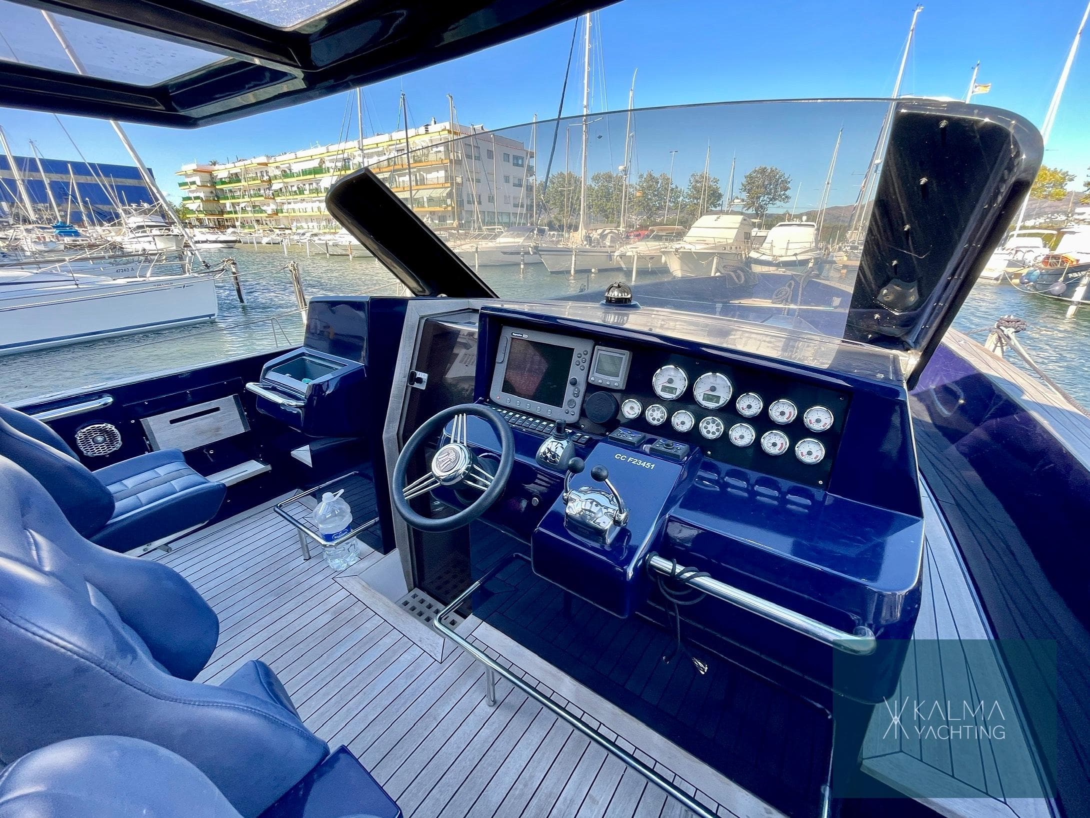 Cockpit of 2008 Fjord 40 Open yacht in harbor.