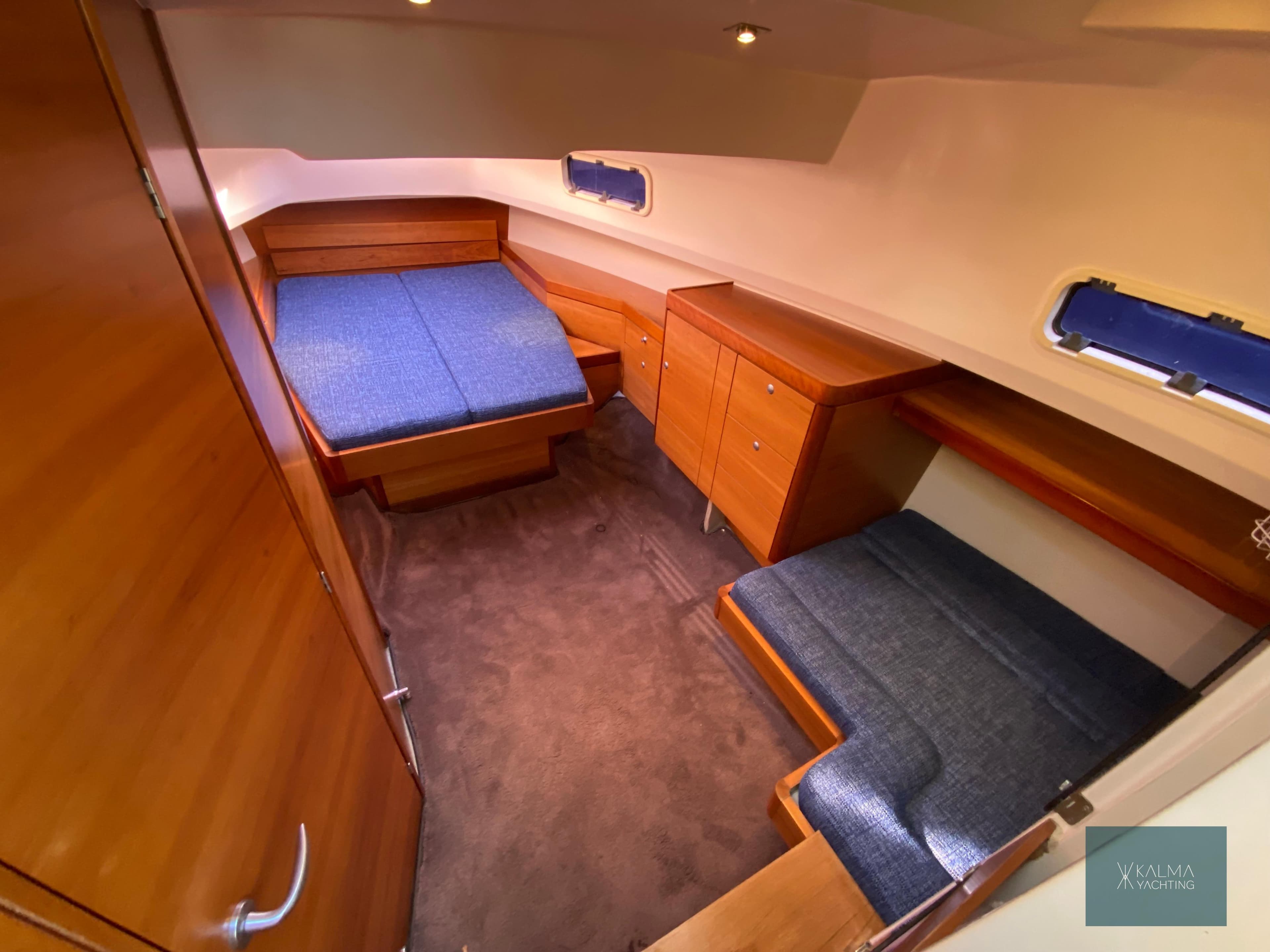 Interior of 2008 Fjord 40 Open yacht with cozy cabin.