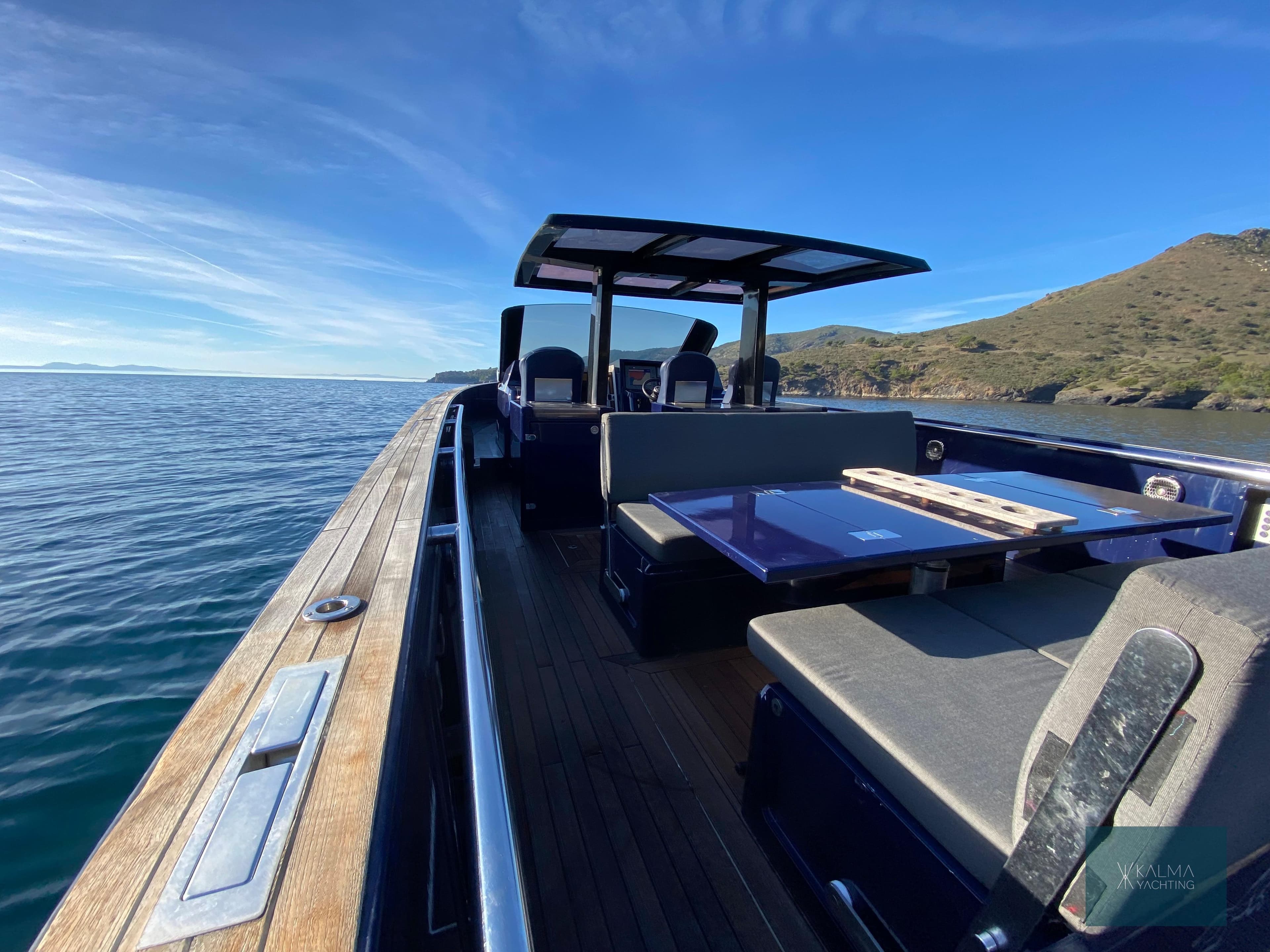 Fjord 40 Open 2008 yacht on calm sea with sunny sky.