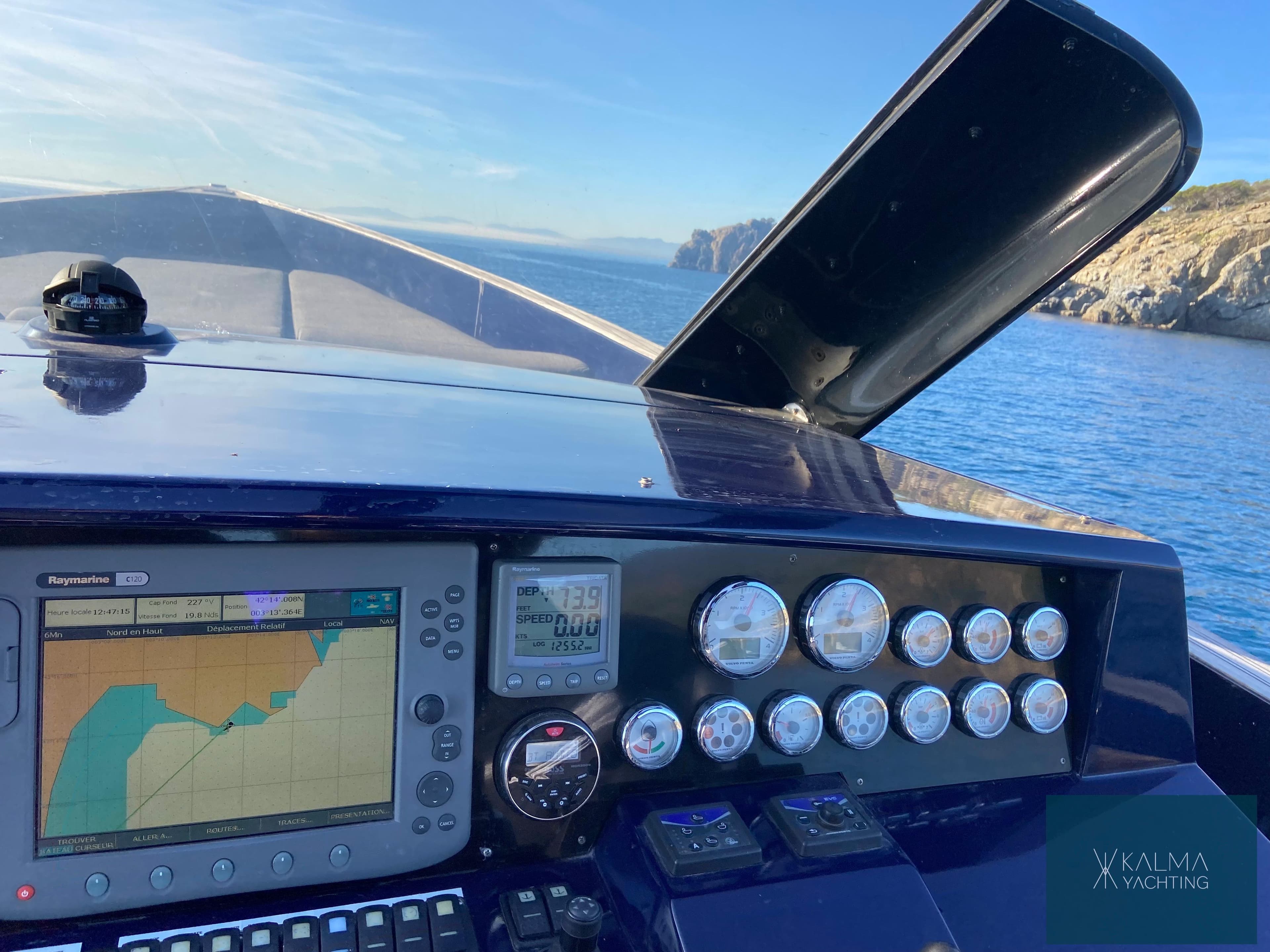 Fjord 40 Open 2008 cockpit with navigation system and sea view.