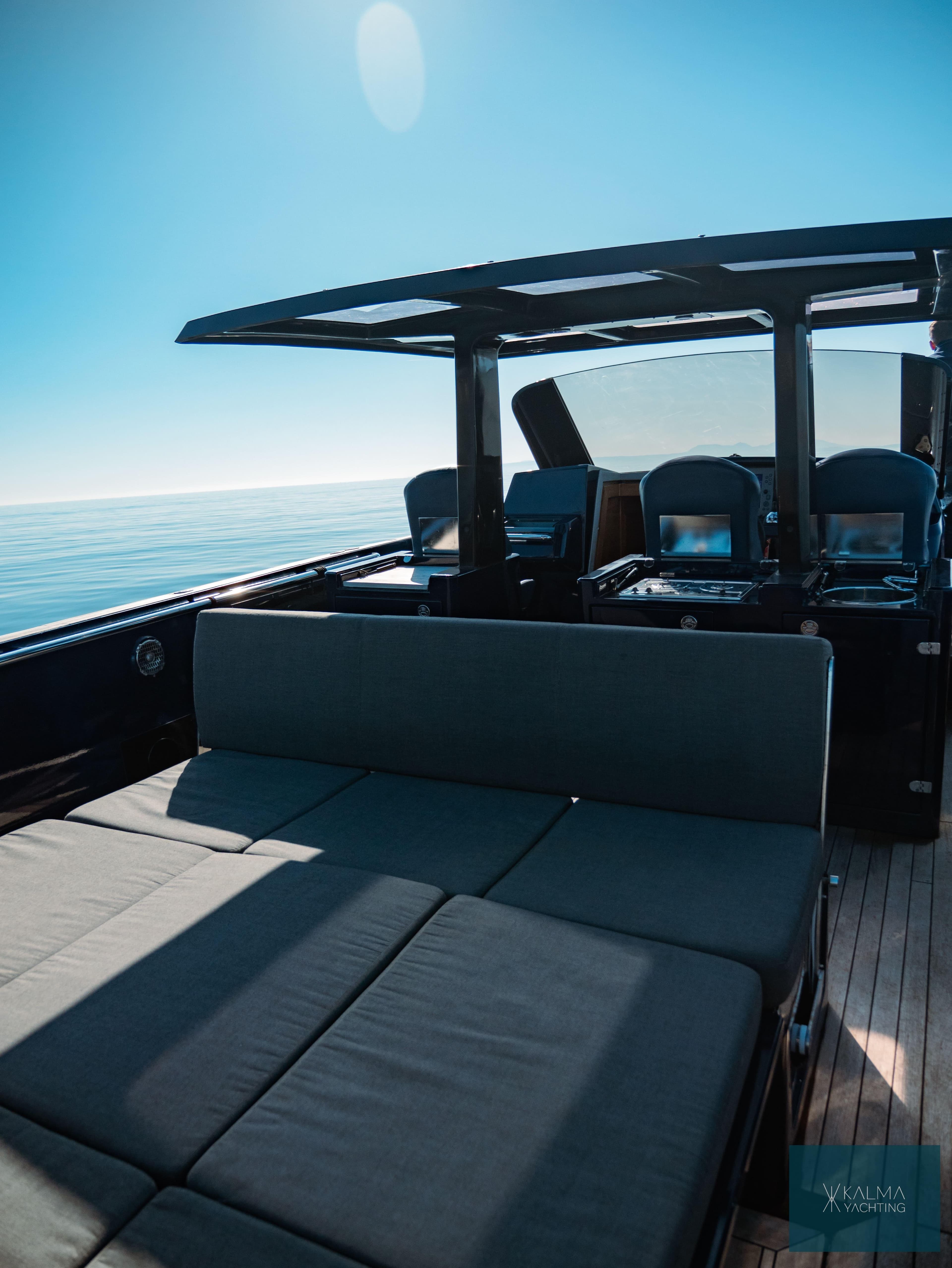 Fjord 40 Open 2008 yacht with sun deck on calm sea.