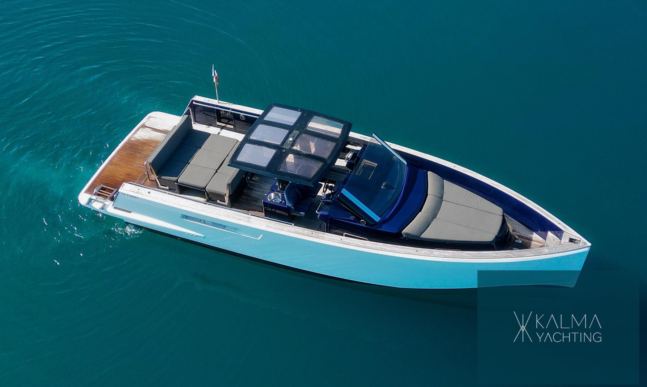 Aerial view of a 2008 Fjord 40 Open yacht on calm water.