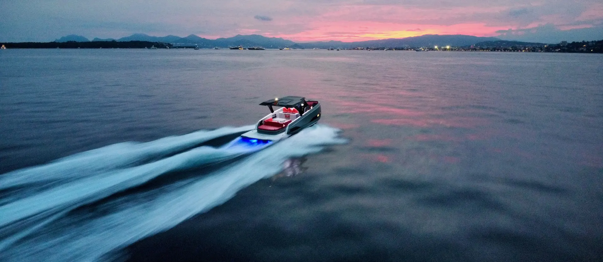 Kumbra 36 running at speed at sunset